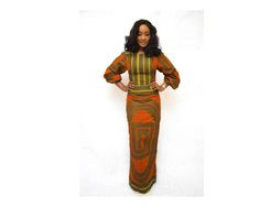 Description Simplicity is the keynote to all true elegance. Estimated shipping time 7- 10 working days Long straight dress African print fabric Long slits on the back Zipper on he back. Long Puff sleeves with elastic on the wrist If you would like to see our clothing store please visit: https://www.etsy.com/shop/HouseOfIzzi?ref=pr_shop_more Size chart UK 4, US 1 Bust : 30 Waist : 22.5 Hip: 32.5 UK 6, US 2 Bust : 33 Waist : 25.5 Hip: 35 UK 8, US 4 Bust : 34 Waist : 26.5 Hip: 36 UK 10, US 6 Bust : Fitted Long Sleeve Ankara Maxi Dress, Fitted Ankara Fabric Agbada In Traditional Style, Fitted Traditional Ankara Fabric Agbada, Fitted Traditional Agbada In Ankara Fabric, African Maternity, African Maternity Dresses, African Shop, Kitenge Designs, Maternity Dresses Summer