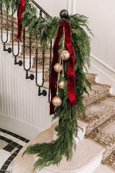 christmas garland and ornaments on the banister