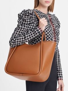 Cognac Tubular Slouchy Tote Bag | CHARLES & KEITH Slouchy Tote Bag, Charles And Keith, Trapeze Bag, Chic Crossbody Bag, Slouchy Tote, Tote Bag Aesthetic, Bag Aesthetic, Oversized Tote Bag, Classic Handbags