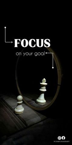 a chess board with the words focus on your goal