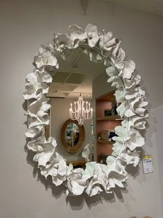 a mirror that is hanging on the wall