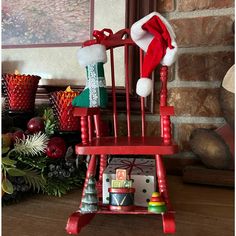 a red rocking chair with christmas decorations on it