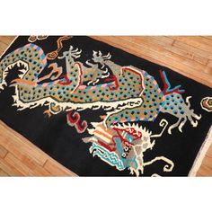 Late 20th Century hand-Knotted Tibetan Rug with a dragon motif on a black field Dragon Rug, Tibetan Dragon, Tibetan Rug, Dragon Tattoo Art, Dragon Motif, Chinese Art Deco, Tibetan Rugs, Art Deco Rug, Vintage Dragon