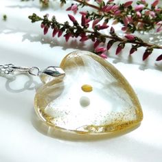 Mustard seed necklace, Sterling silver faith necklace, Baptism gift, Heart pendant with mustard seed and 24k gold dust,  Christian jewellery Beautiful and delicate heart shaped pendant encapsulating mustard seed and 24k gold dust.  The mustard seed is known as a symbol of faith. This unique necklace will make a wonderful baptism or first communion gift.  Each order is beautifully and lovingly packaged in our branded gift box, ready for gift giving. ♡ The pendant is made of jewellery grade, UV st Gold Hypoallergenic Heart Necklace As Gift, Gold Hypoallergenic Heart Necklace For Gifts, Yellow Necklace With Heart Charm For Gift, Hypoallergenic Gold Necklace For Keepsake, Spiritual Gold Heart Necklace For Gift, Spiritual Gold Heart Necklace Gift, Hypoallergenic Gold Necklaces For Keepsake, Spiritual Gold Heart Necklace As Gift, Yellow Necklaces For Valentine's Day Gift