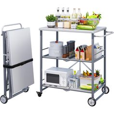 a kitchen cart with food and drinks on it