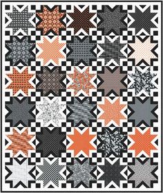 a black and white quilt with many different stars on it's sides, including one in