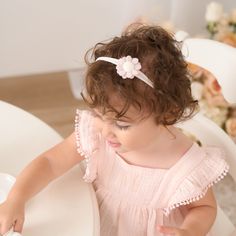 There is just something about a baby girl headband that just makes you say 'awww.' Whether it's a baby girl hair bow or baby headband, the right hair accessory really makes an outfit stand out. Each piece of our luxury baby girl clothing is designed to coordinate with any of these baby girl headbands making the cutest combinations.
2pk Soft stretchy, tonal nylon headband with handmade felt daisies
Presented on header card
Fits babies 0-12 months
Wipe clean as needed Pink Hair Accessories For Babies In Summer, Playful Pink Headband For Summer, White Playful Hair Accessories For Summer, Playful White Hair Accessories For Summer, Playful White Summer Hair Accessories, White Playful Summer Hair Accessories, Cute Pink Headband For First Birthday, Adjustable Pink Hair Accessories For First Birthday, Cute Adjustable Flower Headband