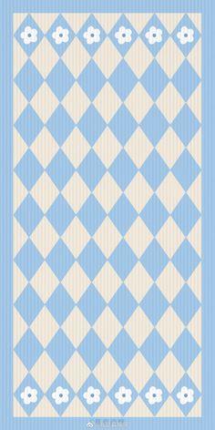 a blue and white quilt with an argyle pattern on the bottom, in two different colors