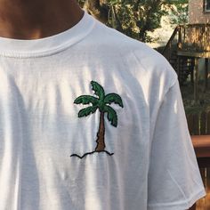 Hand embroidered and customized cotton T-shirts. All sizes are unisex. White Embroidered Logo T-shirt For Summer, Casual Crew Neck T-shirt With Custom Embroidery, Custom Embroidered Cotton T-shirt For Streetwear, Casual Green T-shirt With Embroidered Logo, Embroidered Relaxed Fit T-shirt For Streetwear, Embroidered Crew Neck T-shirt For Streetwear, Embroidered Green Tops For Streetwear, Casual Short Sleeve T-shirt With Custom Embroidery, White Cotton T-shirt With Custom Embroidery