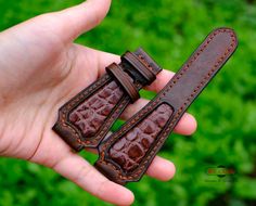 Our watch bands are handmade from 100% genuine premium leather with the mixture of Alligator leather (the middle part) and genuine Vegtan leather. They are made by the skilled hands of Vietnamese Craftsmen. Our leather ages naturally over time to acquire a beautiful patina. H O W ∙ T O ∙ O R D E R ✔ Step 1: Choose the band color (Primary color & Middle color) ✔ Step 2: In Personalization Box: Please Note: - Your Wrist circumference (or strap size) - Watch lug width & buckle width (if you do not choose buckle width, we will make it the same size with the lug) - Your favourite buckle color and stitches color (if you leave this box blank, we will process with random color) C O M P A T I B L E ∙ W I T H ✔ All Apple Watch series: Series 1 - 2 - 3 - 4 - 5 - 6 - SE ✔ Apple Watch 38mm, 40mm, 42mm, Luxury Handmade Brown Watch Bands, Luxury Handmade Brown Watch Accessories, Custom Brown Leather Watch Bands, Best Boyfriend Gifts, Leather Watch Band, Watches Unique, Leather Watch Strap, Classic Watches, Leather Conditioner