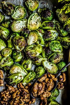 brussel sprouts and walnuts on a tray