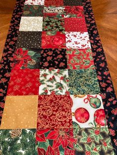 a table runner made out of christmas fabric