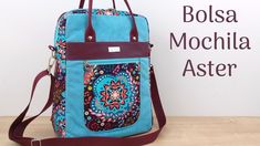 a handbag sitting on top of a wooden table next to a sign that says bolsa mochila aster