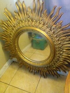 a mirror that is sitting on the floor