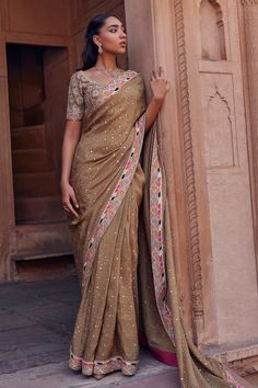 Beige saree with all over bandhani pattern, contrast pot, mirror, dori, sequin, metal and cut dana embroidery. Paired with contrast floral striped embroidered padded blouse. - Aza Fashions Bandhani Pattern, Beige Saree, Saree And Blouse, Padded Blouse, Saree Border, Embroidered Silk, Raw Silk, Sarees Online, Set For Women