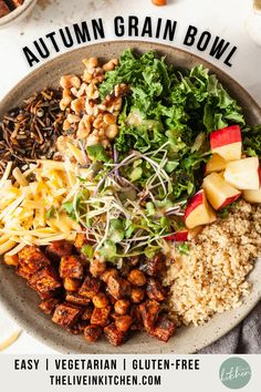 a bowl filled with different types of food and the words autumn grain bowl above it