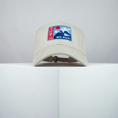 Mount Fuji cotton twill baseball cap with a blue, sky, red and white embroidered design. Top your look with Hatty Hats Embroidery embroidered baseball caps. Embroidered with love <3 in the United Kingdom. ♥ Baseball cap with Mount Fuji embroidered design. ♥ One size fits all unisex hat with adjustable strap at rear. ♥ 100% Cotton twill fabric. ♥ Hat colour available in: Grey / Green / White / Black / Red / Beige / Blue / Navy / Olive Green / Burgundy. ♥ Designed by & exclusive to Hatty Hats Embroidery. ♥ Embroidered in the United Kingdom. View our full assortment of hats here - https://www.etsy.com/uk/shop/HattyHatsEmbroidery 🚚🌎 Free UK shipping on all orders + Free worldwide shipping on orders over $35 / £35 Six-panel Baseball Cap With Logo Patch For Outdoors, White Casual Snapback Hat For Travel, White Baseball Cap For Hiking, Cotton Baseball Cap With Curved Bill For Travel, Outdoor Hat With Logo Patch And Curved Visor, Curved Visor Hat With Logo Patch For Outdoor, Outdoor Dad Hat With Embroidered Logo, Six-panel, Outdoor Six-panel Hats With Letter Print, Outdoor Dad Hat With Embroidered Logo And Six-panel Shape