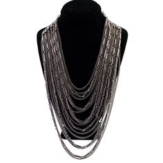 A vintage layered chain silver tone necklace. This is a fun piece that looks great on. It has a hook clasp and can be worn at adjustable lengths. The shortest chain is 15.75 inches long. In good condition. Silver Chunky Multi-strand Necklace, Silver Chain Link Layered Necklace, Silver Multi-strand Metal Chain Necklace, Multi-strand Silver Chain Necklace, Silver Multi-strand Chunky Chain Layered Necklace, Silver Chunky Chain Multi-strand Layered Necklace, Silver Multi-strand Layered Necklace With Chunky Chain, Silver Multi-strand Necklace With Chunky Chain, Silver Double Chain Multi-strand Necklace