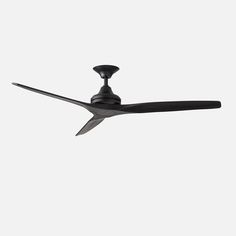 a ceiling fan that is black and has two blades on the blades, with one light on