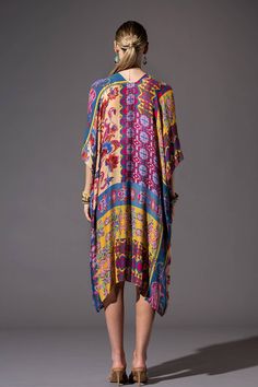 Introducing our Lightweight stylish Kimono, a captivating combination of geometric, floral, and paisley patterns for an eye-catching ensemble. 100% Viscose *APPROX. L 38" W 40" Casual Summer Kimono With Paisley Print, Multicolor Floral Print V-neck Kimono, Multicolor V-neck Kimono With Floral Print, Casual Summer Paisley Print Kimono, Bohemian Patterned Kimono With Vibrant Print, Long Patterned Kimono With Floral Print, Long Patterned Floral Print Kimono, Colorful Patterned Spring Kimono, Multicolor Long Kimono With Boho Print