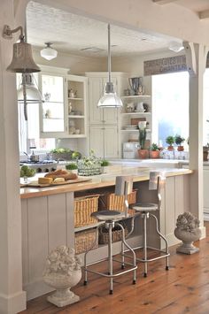 the kitchen is clean and ready to be used as a dining room or breakfast nook