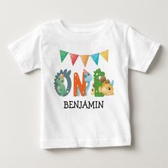 Boy First Birthday Dinosaur Shirt features typography script one with dinosaurs and a name. First Birthday Dinosaur, Top Gifts For Boys, First Birthday Boy, Dinosaur Birthday Party Decorations, Chic Invitation, Birthday Dinosaur, Dino Birthday Party, Dinosaur First Birthday, Baby Boy First Birthday