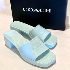 Coach Scarlett Rubber Block Heel Sandals Size 10 Sea Mist (Green/Blue) These Cute Block Heel Rubber Sandals Will Be Your Go-To-Sandal For The Warmer Months: - Rubber Material, With A Gloss Finish - Textured Coach “C” Logo Footbed - Ridge Soles - Square Toe - Single Strap With Coach Badge Logo Embossed On It - Heel Height Approximately 2.25”; Platform Approximately 1” - Color: Sea Mist (This Is A Pale Green/Blue Color) - Size Is 10 - Note: Also Available In Black Size 9 (See Last Pic And My Other Coach Sandals For Spring Formal Occasions, Coach Closed Toe Heels For Spring, Chic Slip-on Coach Heels, Coach Summer Block Heel Shoes, Coach Slip-on Summer Heels, Coach Block Heel Spring Heels, Coach Summer Heels With Heel Strap, Coach Block Heel Heels For Spring, Coach Summer Block Heels