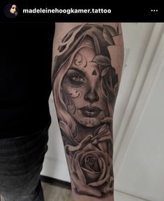 a woman's arm with a tattoo on it