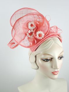 This women's peach/coral fascinator hat is a sure bet for Kentucky Derby or Kentucky Oaks. Or any summer event really, like church, ladies tea, or just for fun. It is made with sinamay straw and is very light and airy. The hand sculpted sinamay sits atop a handmade bandeau base and is secured with an elastic band that goes behind the ears and head to keep the hat in place. It is topped with vintage daisies and hand rolled sinamay leaves as well as sinamay swirls for added texture. An inner grosg Kentucky Oaks, Ladies Tea, Custom Made Hats, Large Brim Hat, Sinamay Fascinator, Sinamay Hats, Types Of Hats, Ribbon Headbands, Large Hats