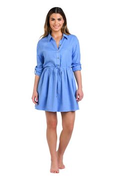 Effortlessly chic, this chambray-colored cover-up complements any beach ensemble, offering a versatile and neutral layer for your seaside adventures. This chic and casual shirt dress features a button-down front, classic collar, and a waist-defining drawstring. The three-quarter sleeves with button tabs and the gathered waist create a flattering silhouette. [split] Details Shirt dress Button front Three-quarter sleeves Tunnel waist Drawstring with gold cord ends Pockets Hits mid-thigh Fabric 80% Chambray Button-up Denim Dress For Day Out, Casual Chambray Button-up Dress, Casual Chambray Denim Button-up Dress, Summer Chambray Button-up Shirt Dress, Medium Wash Chambray Button-up Shirt, Chambray Shirt Dress, Button Front Dress, Cord Ends, Dress Cover