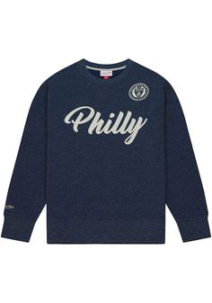 Head out in style with our Philadelphia Union Navy Blue Playoff Win 2.0 Fashion Sweatshirt! This Union Long Sleeve Sweatshirt features a applique team graphic on center chest. You'll be warm, comfortable and stylish as you head to class, the game or just out on the town in this Union Fashion Sweatshirt. Made of 100% cotton, Applique team graphic on center chest, Ribbed collar, cuffs and waistband, Mitchell & Ness script embroidery on right cuff, Comfy material, Fit: True to Size, 100% COTTON, Ma Collegiate Blue Top With Embroidered Logo, Blue Sports Top With Logo, Casual Crew Neck Top With Team Logo, Casual Tops With Embroidered Logo For Fan Gear, Casual Sweatshirt With Embroidered Logo For Fans, Blue Crew Neck Sweatshirt With Team Logo, Casual Blue Sweatshirt Fan Gear, Casual Blue Sweatshirt For Fans, Navy Casual Sweatshirt For Sports Season