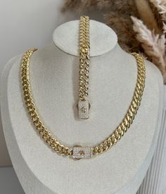 Wearing a cuban chain set is a symbol of luxury, wealth, and success. This beautiful set of Monaco chain and bracelet is designed to fit comfortably on you and to complete your everyday look. ✨DESCRIPTION✨ METAL: High Quality Stainless Steel FINISH: 14k gold plated STONE: Cubic Zirconia  WIDTH: 8mm BRACELET LENGTH: 6.5 inches and 7 inches  CHAIN LENGTH: 16 inches and 18 inches   QUALITY: WaterProof, Nickel-free, Hypoallergenic and Tarnish Free COLOR: Gold CLOSURE: BOX ✨JEWELRY CARE QUIDE✨ * Bath Elegant Cuban Link Gold Chain Necklace, Luxury Classic Cuban Link Necklace With Box Chain, Luxury Cuban Link Bracelet With Box Chain As Gift, Luxury Gold Chain Necklaces For Anniversary, Elegant 14k Gold Cuban Link Necklace, Luxury Elegant Cuban Link Gold Necklace, Elegant Cuban Link Bracelet With Adjustable Chain, Luxury Rectangular Jewelry With Rolo Chain, Luxury Cuban Link Curb Chain Jewelry