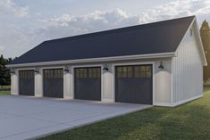 a two car garage with three windows on the front and one door open to let in light