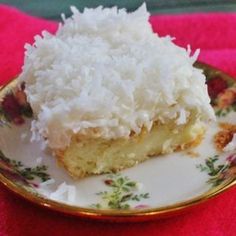 a piece of coconut cake on a plate