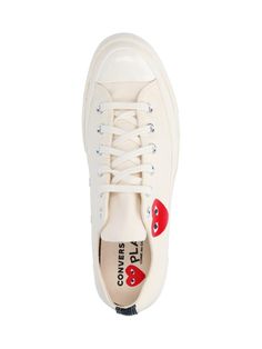 Comme des Garçons Play Converse Chuck 70 low sneakers in white cotton with round toe with rubber detail, laces, red heart print on the side, and rubber sole. composition: 100% cotton White Cotton Sneakers With Rubber Sole, White Canvas Lace-up Shoes With Red Sole, White Lace-up Canvas Shoes With Red Sole, Casual White Canvas Shoes With Red Sole, White Canvas Sneakers With Red Sole, Comme Des Garcons Play Converse, Converse Chuck 70 Low, Play Converse, Chuck 70 Low