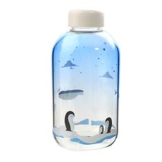 a water bottle with two penguins in it