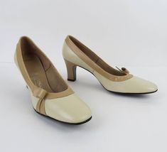 Retro Court Shoes With Sculpted Heel And Round Toe, Retro Beige Leather Heels, Retro Beige High Heels, Vintage Cream Heels With Round Toe, Vintage Cream Heels With Almond Toe, Retro Cream Heels For Formal Occasions, Vintage Cream High Heels, Vintage Beige Heels Medium Width, Vintage Beige Medium Width Heels