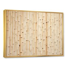 a bamboo wall panel with gold trimmings on the edges and bottom, against a white background