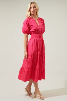 The Jamila Hacienda Puff Sleeve Midi dress is made of a breathable and lightweight cotton, it features a trendy split neckline with voluminous puff sleeves. Its smocked waist adds shape to the silhouette. Won’t forget to mention the flowy fit in the bottom that makes it simply amazing to wear out. Perfect for any special occasion or to be walk around in style anywhere you go!- Popin- Puff sleeves- Smocked waist- Split neckline- Comes in 3 colorsSize + Fit - Model is 5'8" and wearing size XS- Mea Cotton Smocked Puff Sleeve Dress For Brunch, Billowy Puff Sleeve Peasant Dress For Spring, Spring Peasant Dress With Puff Elastic Sleeves, Spring Peasant Dress With Puff Sleeves And Gathered Sleeves, Billowy Puff Sleeve Peasant Dress, Summer Smocked Dress With Balloon Sleeves, Puff Sleeve Smock Midi Dress For Brunch, Billowy Puff Sleeve Peasant Dress For Summer, Brunch Peasant Dress With Puff And Gathered Sleeves