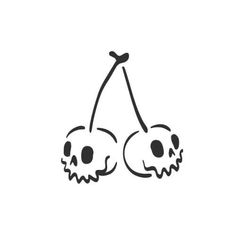 two cherries with skulls on them, one is black and the other is white