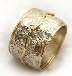 Textured wide silver and gold ring Handmade sterling silver and yellow gold band. with texture that looks like crumpled tinfoil- ilanamir by ilanamir on Etsy Wide Band Hand Cast Rings For Anniversary, Anniversary Rings With Hand Cast Wide Band, Anniversary Hand Cast Wide Band Rings, Elegant Hand Cast Wide Band Jewelry, Hand-forged Wide Band Jewelry For Anniversary, Elegant Wide Band Hand Cast Jewelry, Handmade Wide Band Wedding Ring, Unique Hammered Wide Band Rings, Unique Wide Band Hammered Jewelry