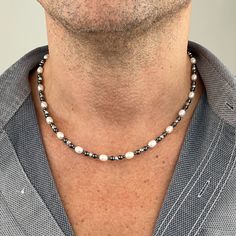 You can find these real pearl necklaces only in our store. Just for you! Discover the privilege that perfect men's jewelery pieces for modern people will create in your style. Make a difference with your compliment-worthy style. Features of the necklace: - Pearl size: 6mm freshwater pearl - Pearl color: White - Luster: High - Beads quality: AAA + - Diamond Cut Rhodium Silver Bead - Hematite Bead - Clasps: Stainless steel Lobster Clasp  - Necklace size: 18"(46 cm), 19"(48 cm), 20"(51 cm), 21"(53 Silver Necklace For Men, Pearl Silver Necklace, Modern People, Mens Beaded Necklaces, Real Pearl Necklace, Silver Pearl Necklace, Mens Silver Necklace, Men Gifts, Clasp Necklace