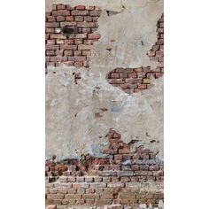 an old brick wall with peeling paint on it