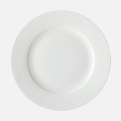 an empty white plate on a white background