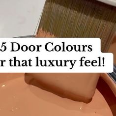 a close up of a paint brush with the words 5 door colours for that luxury feel