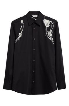 Pressed flower embroidery appears almost ghostly as it harnesses this soft cotton sateen button-up shirt. French placket Point collar Long sleeves with button cuffs 100% cotton Dry clean Imported Designer Clothing Designer Embroidered Black Shirt, Black Embroidered Cotton Shirt, Black Collared Shirt With Floral Embroidery, Luxury Embroidered Black Shirt, Black Embroidered Button-up Shirt, Flower Embroidery, Deep Black, Pressed Flower, Embroidered Flowers