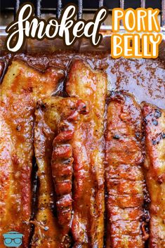 grilled pork bellys with bbq sauce on top and the words smoked pork belly above it