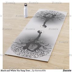 yoga mat with yin tree design on it