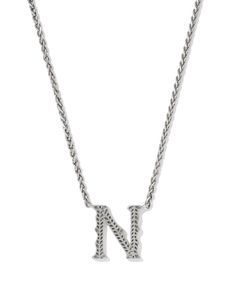 The beloved letter necklace style meets the charm of the Lone Star State in the Beau Letter N Pendant Necklace in Vintage Silver. Crafted in vintage-inspired metal, this pendant’s etched script is a play on our signature hoofprint detailing. Whether you’re showing off your initials or someone else’s, this style will be hard to ignore. This necklace is a part of Yellow Rose by Kendra Scott—a brand that celebrates ranch life with Kendra Scott staples alongside select curated jewelry pieces and acc Silver Kendra Scott, Hoof Print, Sold Out Sign, Lone Star State, Ranch Life, Letter N, Letter Necklace, Lone Star, Yellow Roses