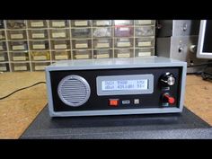 an old radio sitting on top of a table